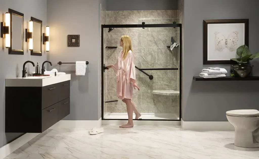 Shower with person standing in bathroom