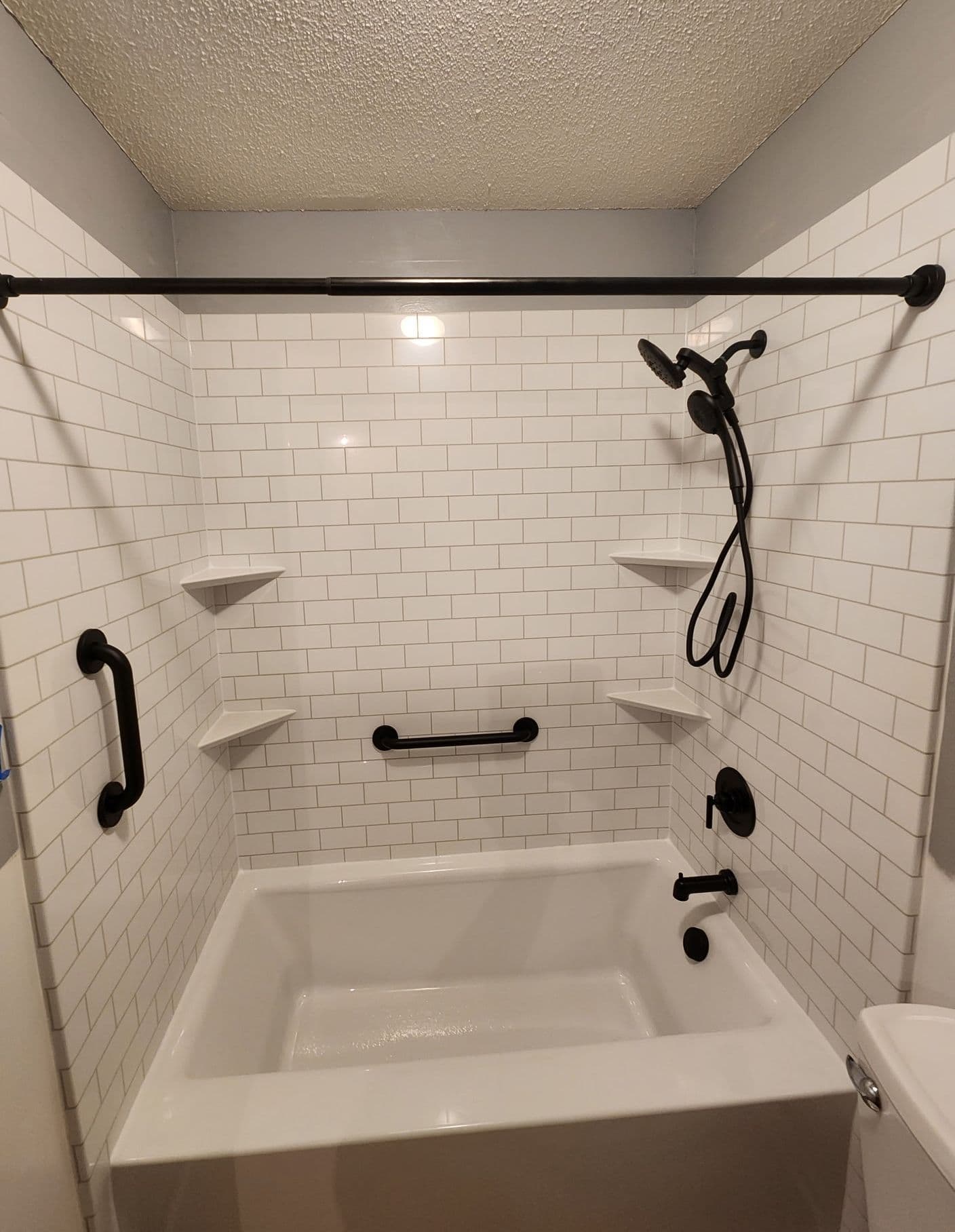 White tub with black hardware